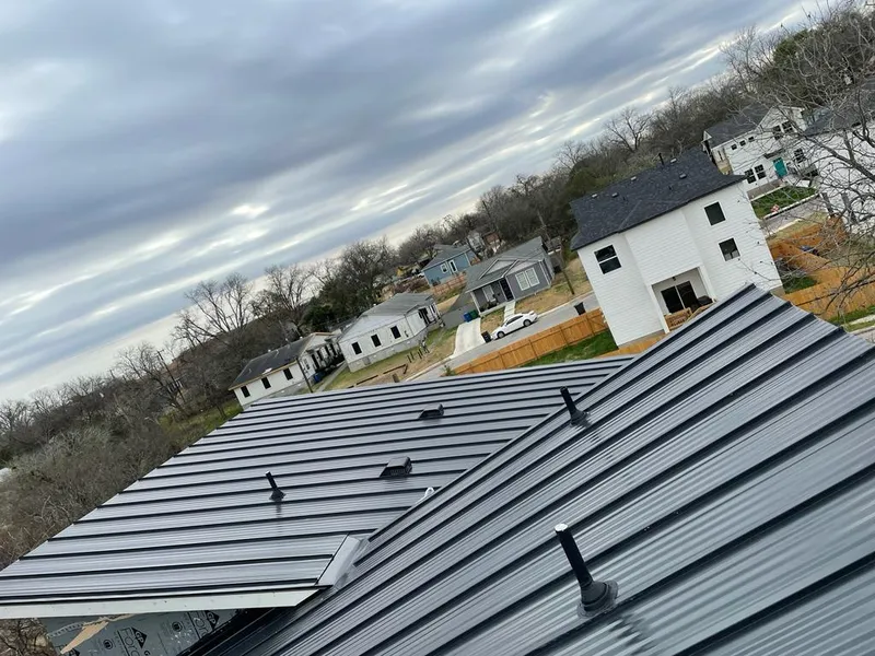 Standing seam metal roof panels with vents for Skylight Repair in Godley